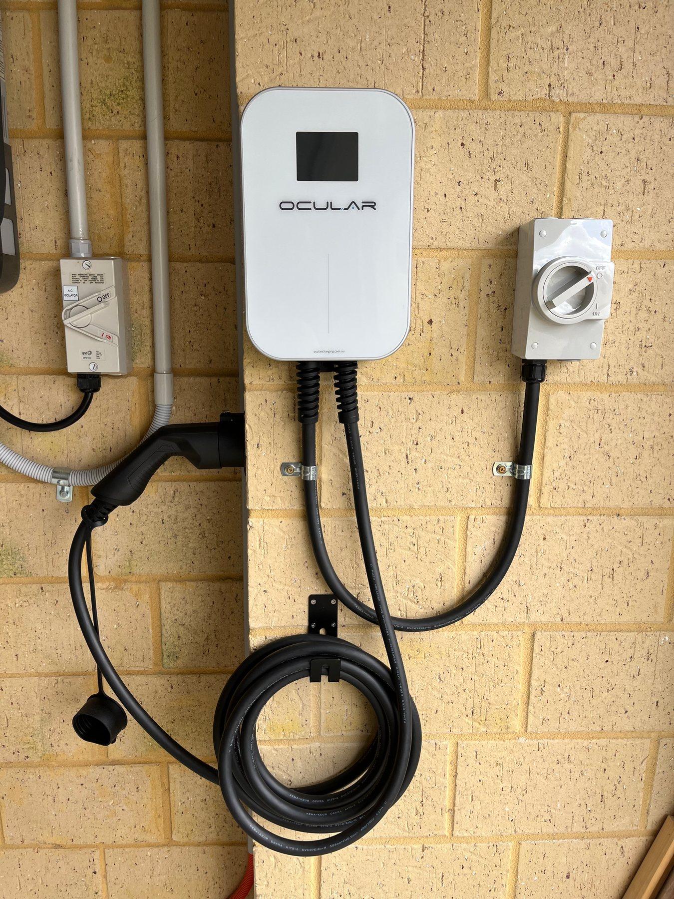 Home EV charger with dedicated isolator installed by Quantum