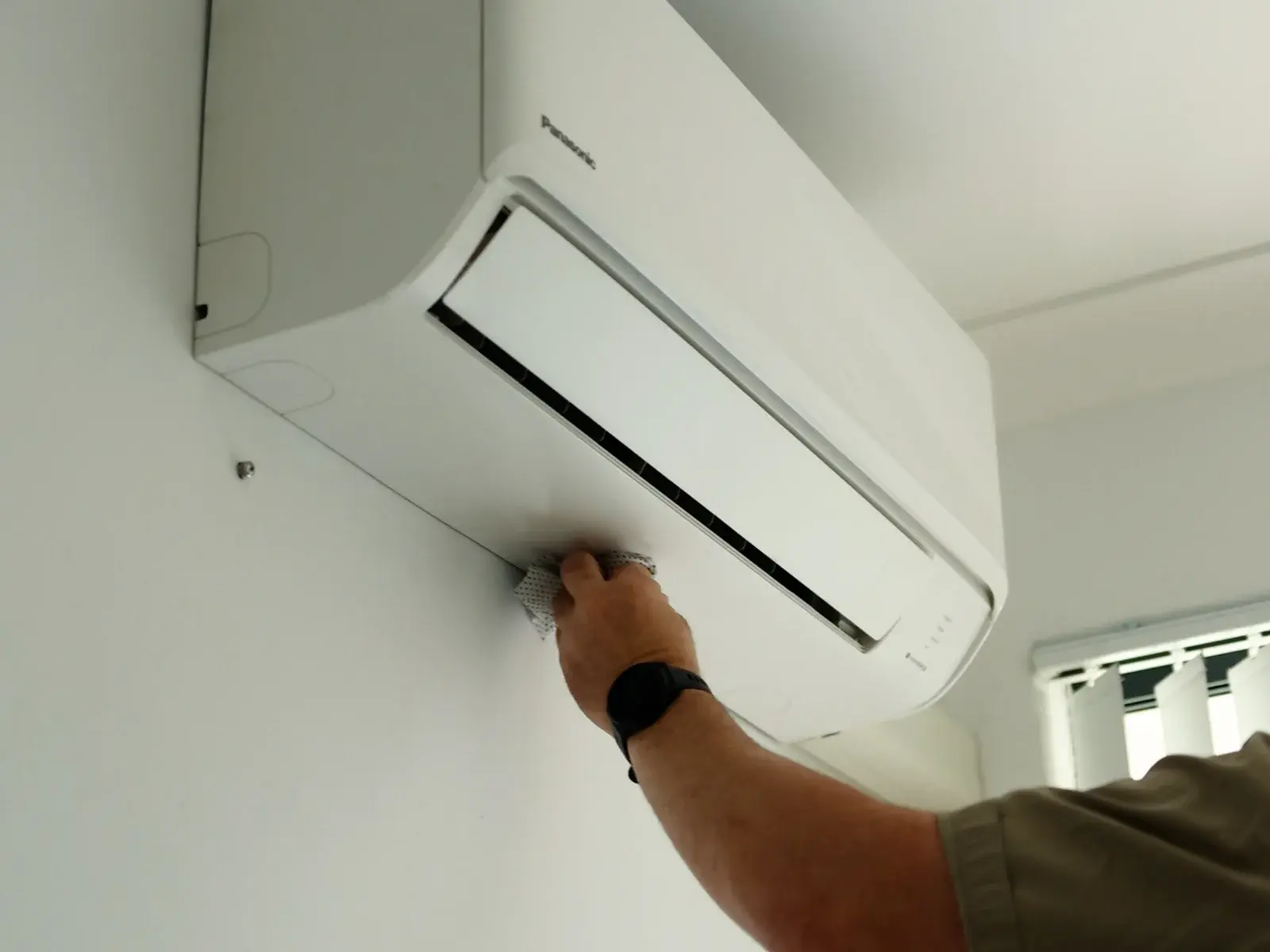 Quantum apprentice connecting the refrigerant lines to a split-system outdoor unit